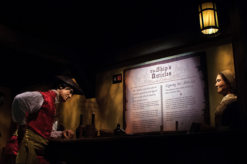 a group of people in a dark room