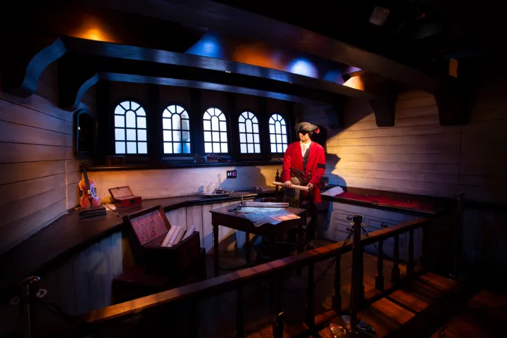 a couple of people that are standing in the kitchen